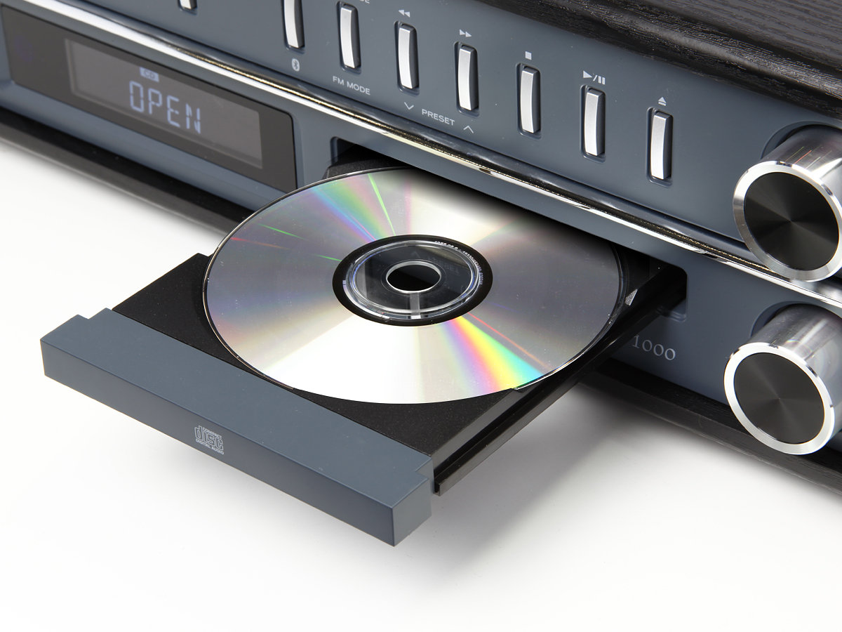 Первая компакт. CD (Compact Disk ROM) DVD (Digital versatile Disc). DVD (Digital versatile Disc). Teac LP-p1000. CD (Compact Disc) — оптический носитель.