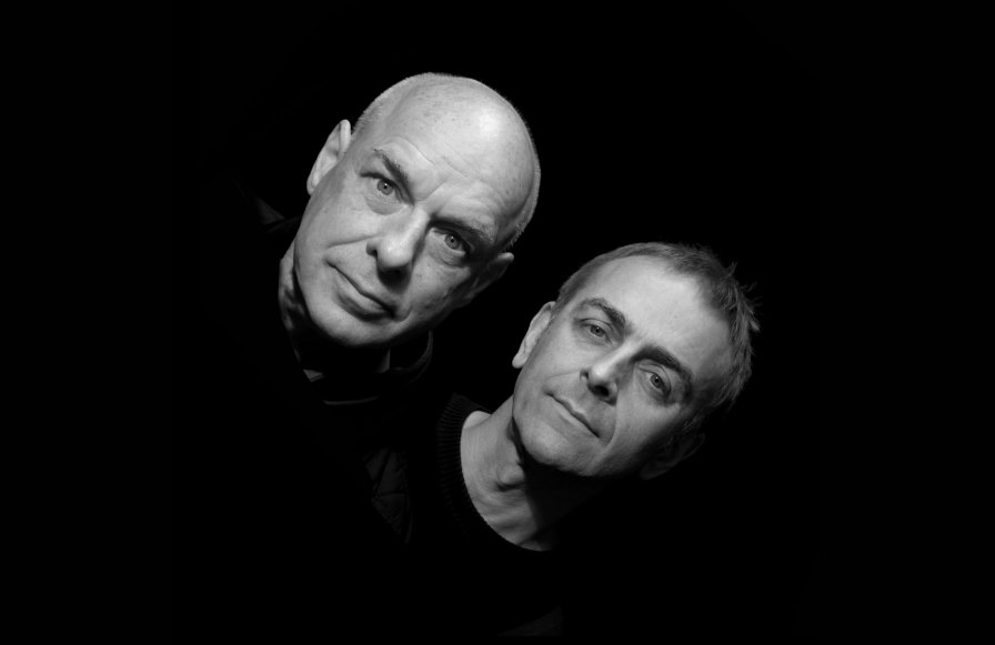 Brian Eno and Karl Hyde to release new collab LP High Life, toast their accomplishment with shitty American beer