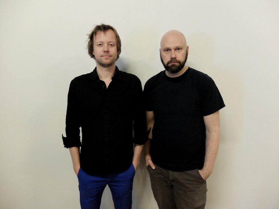 Kim Myhr & Lasse Marhaug, with heads tilted upward, announce first collaborative album