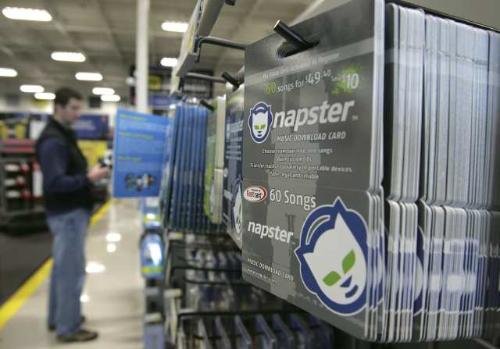 Rhapsody buys Napster from Best Buy and picks up some gummi worms in the checkout line