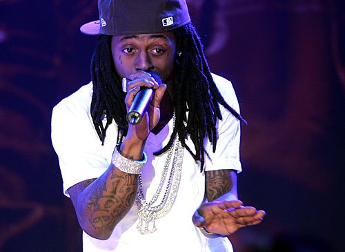Lil Wayne announces next album Devol (&quot;Loved&quot; spelled backwards), unfortunately not under new age alias &quot;Lil Enyaw&quot;